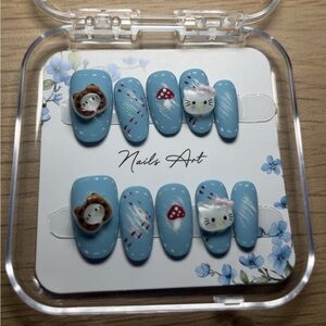 Blue Hello Kitty–inspired press-on nail set 💙🐱🍄